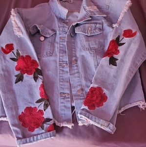 Distressed rose denim jacket